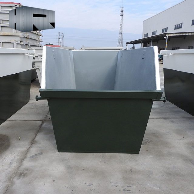 skip bin with one side tilted