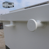 skip bin with one side tilted